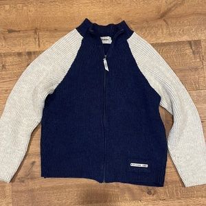 Nice thick woven cardigan, navy blue, and cream. Perfect condition.